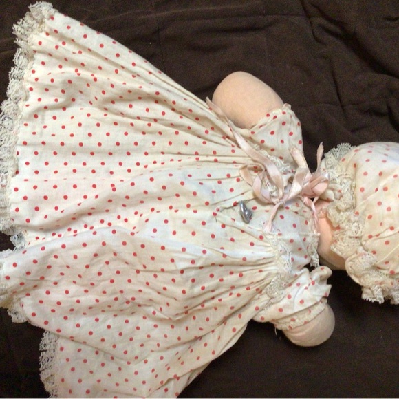 A collectible soft body baby doll with a pull-string musical feature - Picture 2 of 2